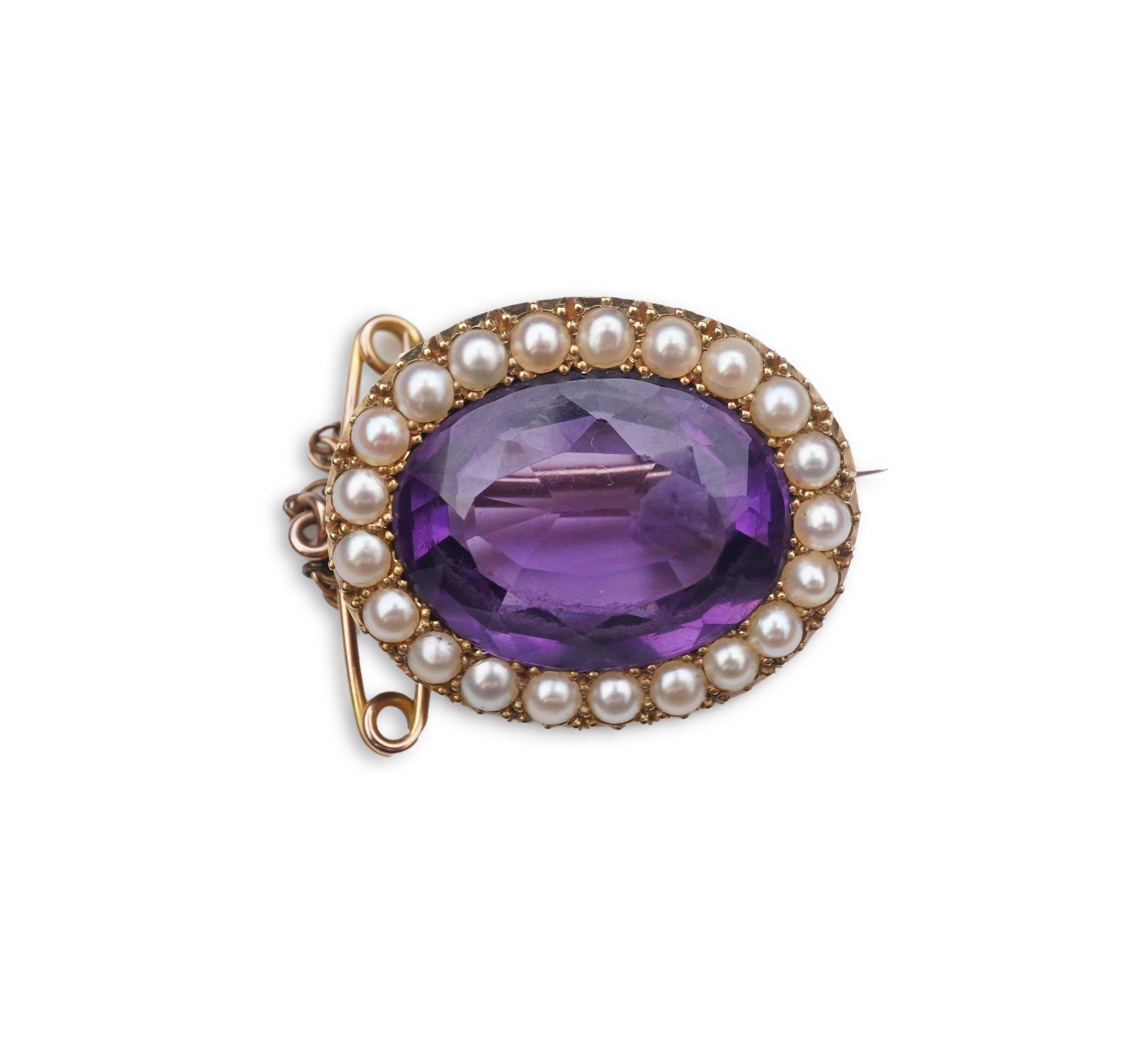 An amethyst and split pearl brooch, circa 1900